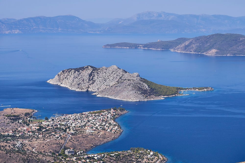 An Aegina day trip looks over Perdika village and the small island of Moni