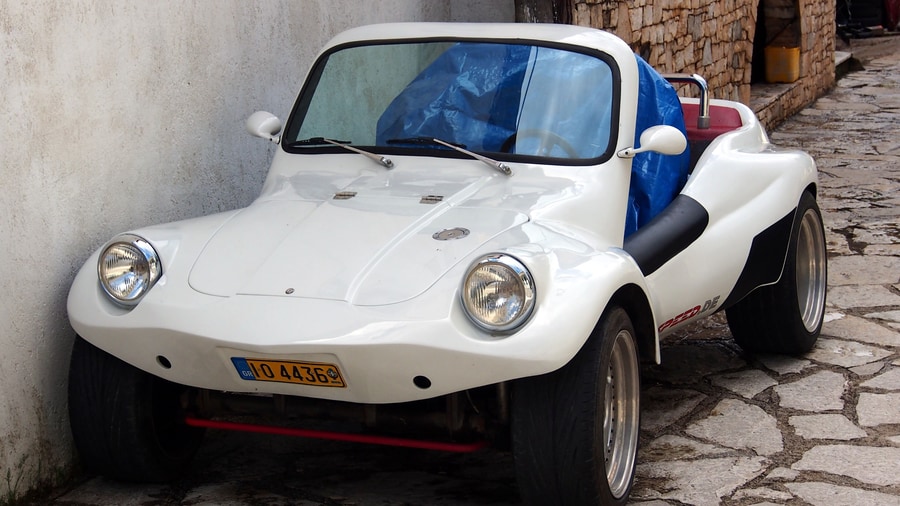 A Crete buggy safari drives an open two-seat dune buggy built on the light frame of the classic beach buggy