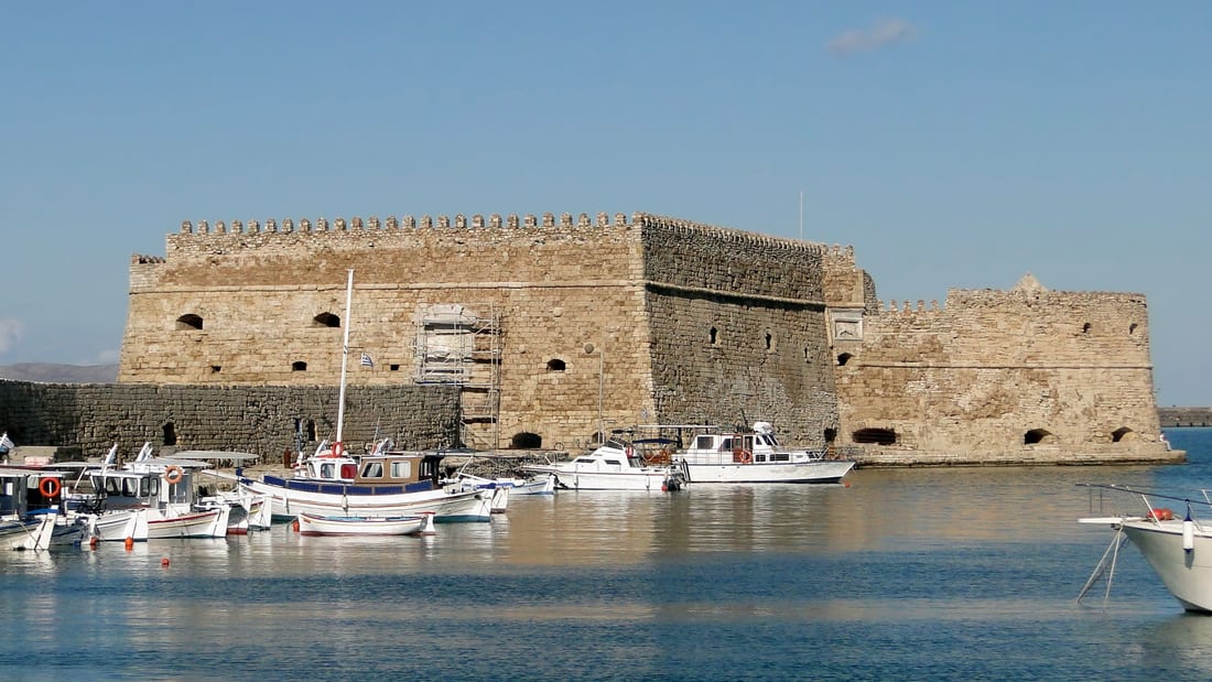 A Heraklion tour starts at the Venetian Koules fortress beside the fishing boats of the old harbour