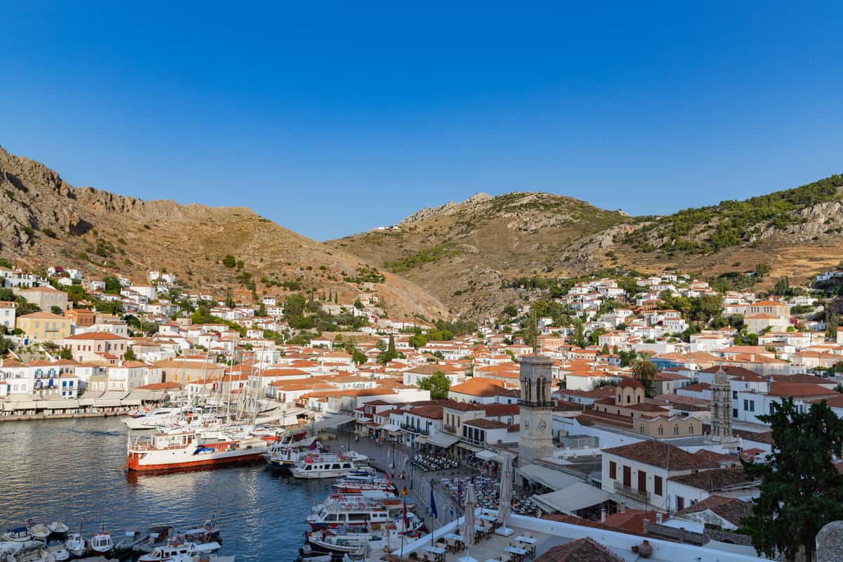 A Hydra Poros Aegina cruise docks in the harbour of Hydra