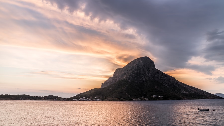 The islet of Telendos at sunset across the channel from Kalymnos, a stop on a Kalymnos boat trip