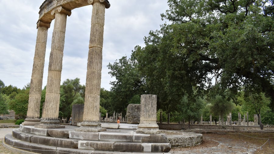 A Katakolon shore excursion reaches the Philippeion at Olympia, the round building with Ionic columns in the Altis