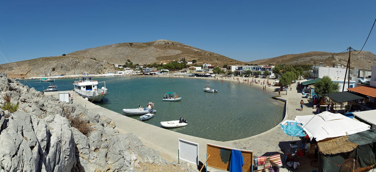A Kos boat trip stops in the bay of Pserimos with its beach and village