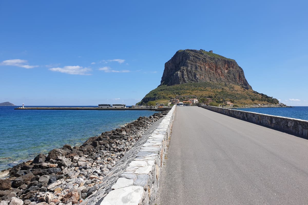 A Monemvasia tour crosses the causeway to the great rock of Monemvasia rising from the sea