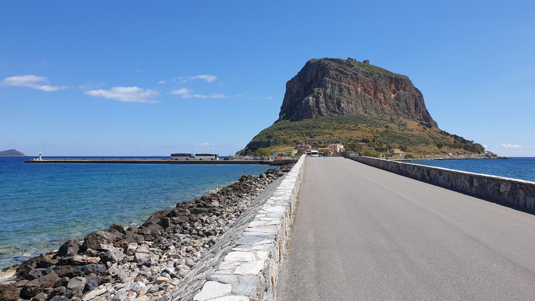A Monemvasia tour crosses the causeway to the great rock of Monemvasia rising from the sea