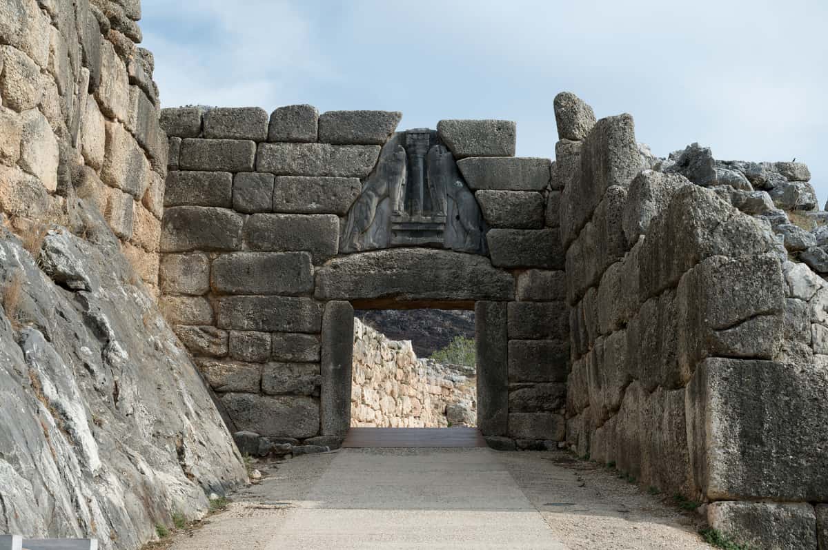 A Mycenae Epidaurus day trip enters Mycenae through the Lion Gate