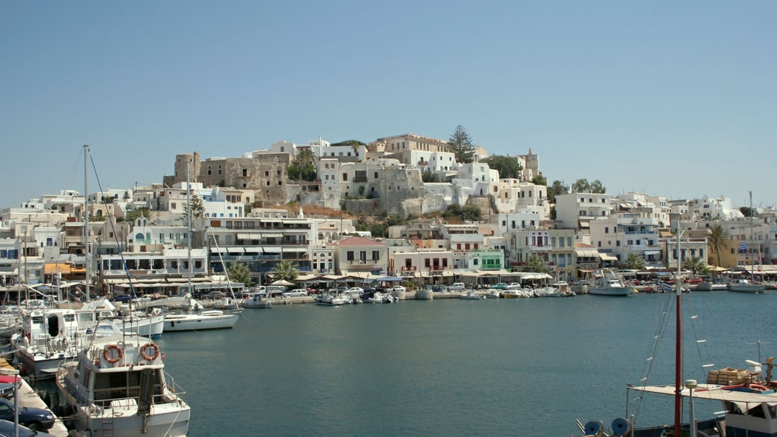 A Naxos cooking class starts from Chora, the harbour town of Naxos below the old Venetian castle