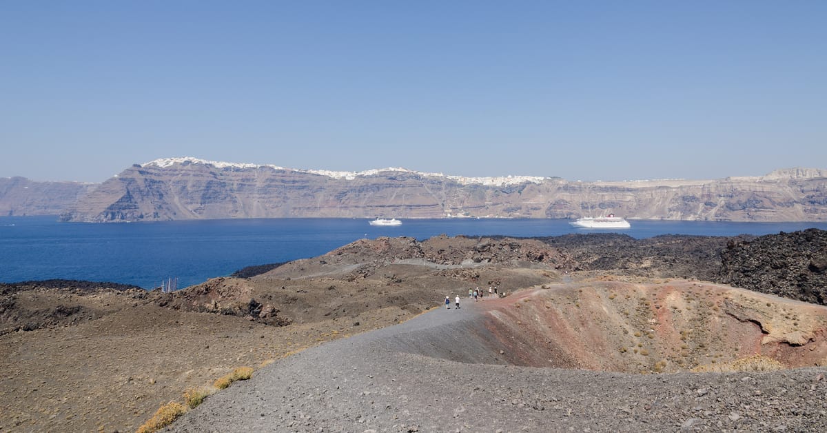 A Santorini catamaran cruise stops near the volcanic island of Nea Kameni
