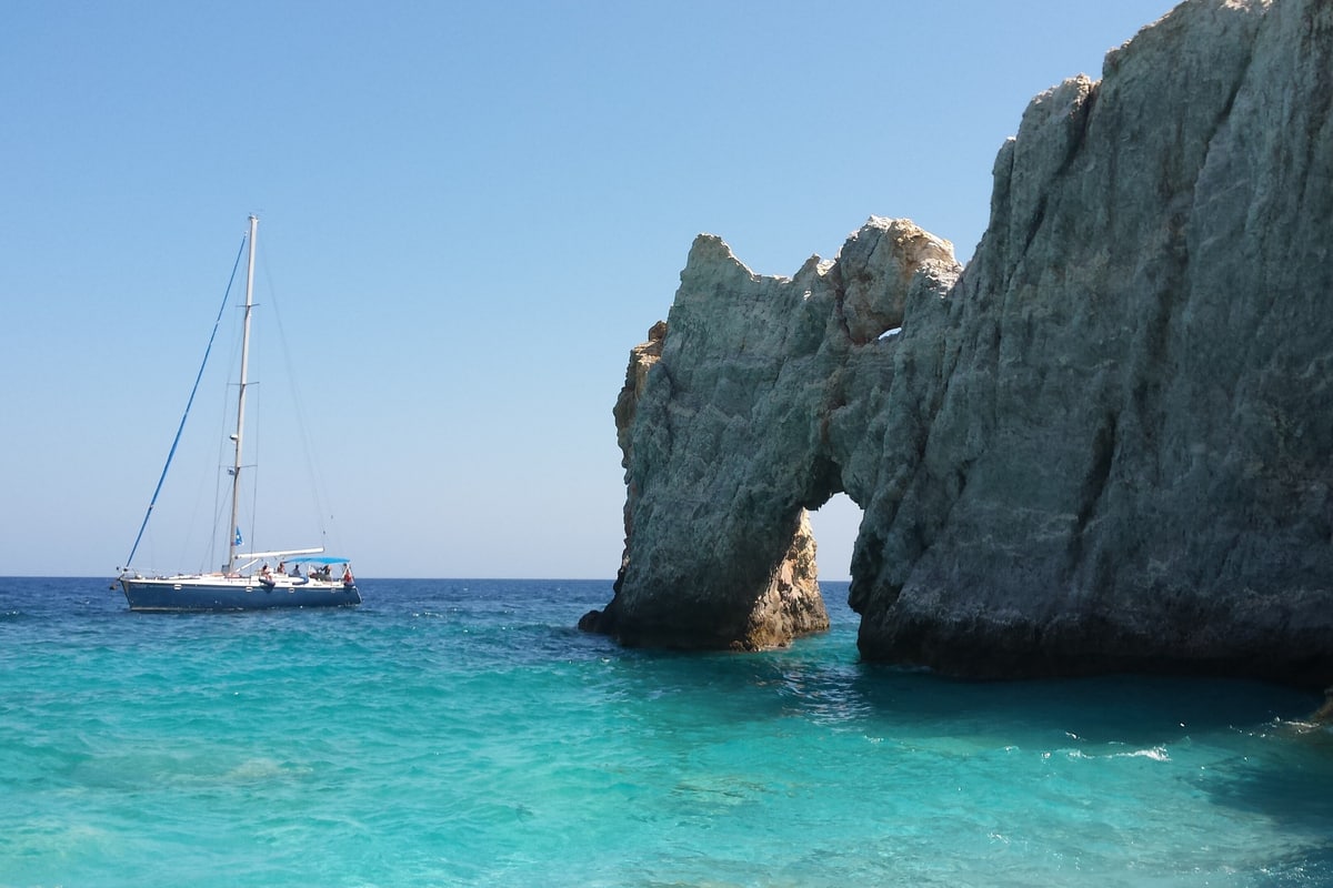A Skiathos boat trip reaches the rock arch at Lalaria beach