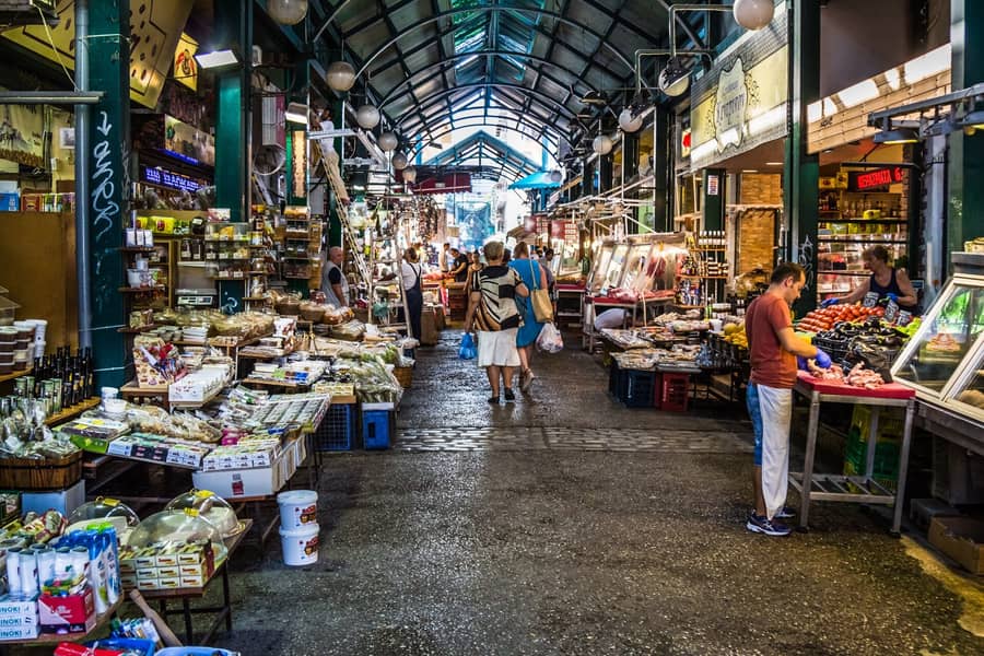 A Thessaloniki food tour walks through the covered stalls of the Kapani market