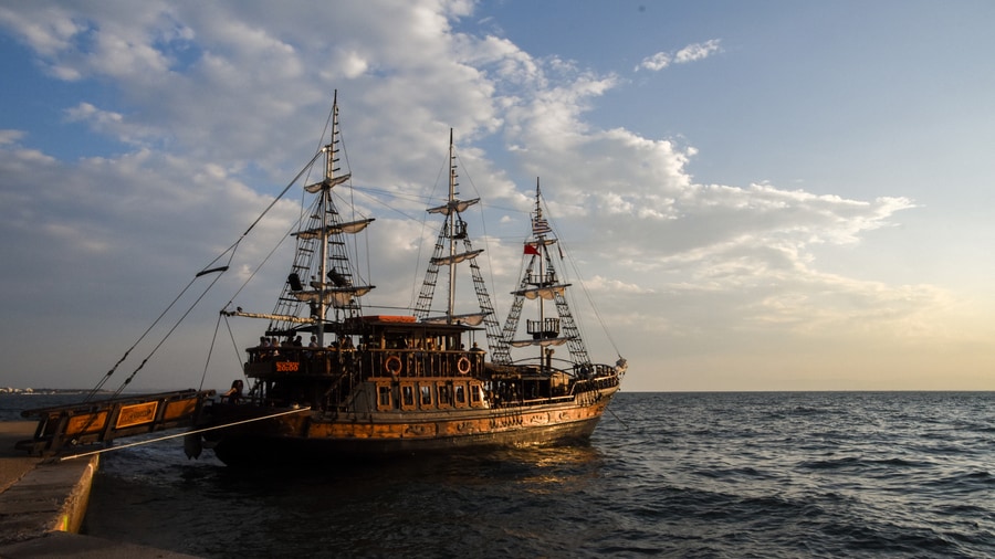 Three-masted wooden bar boat moored at the Thessaloniki waterfront, a base for a Thessaloniki sunset cruise